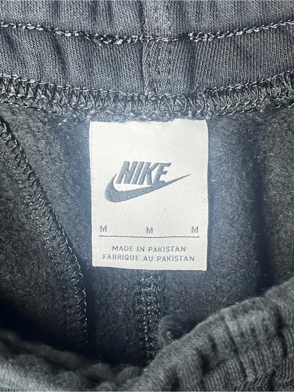 Nike Black Kids Sweatpants with White Swoosh
